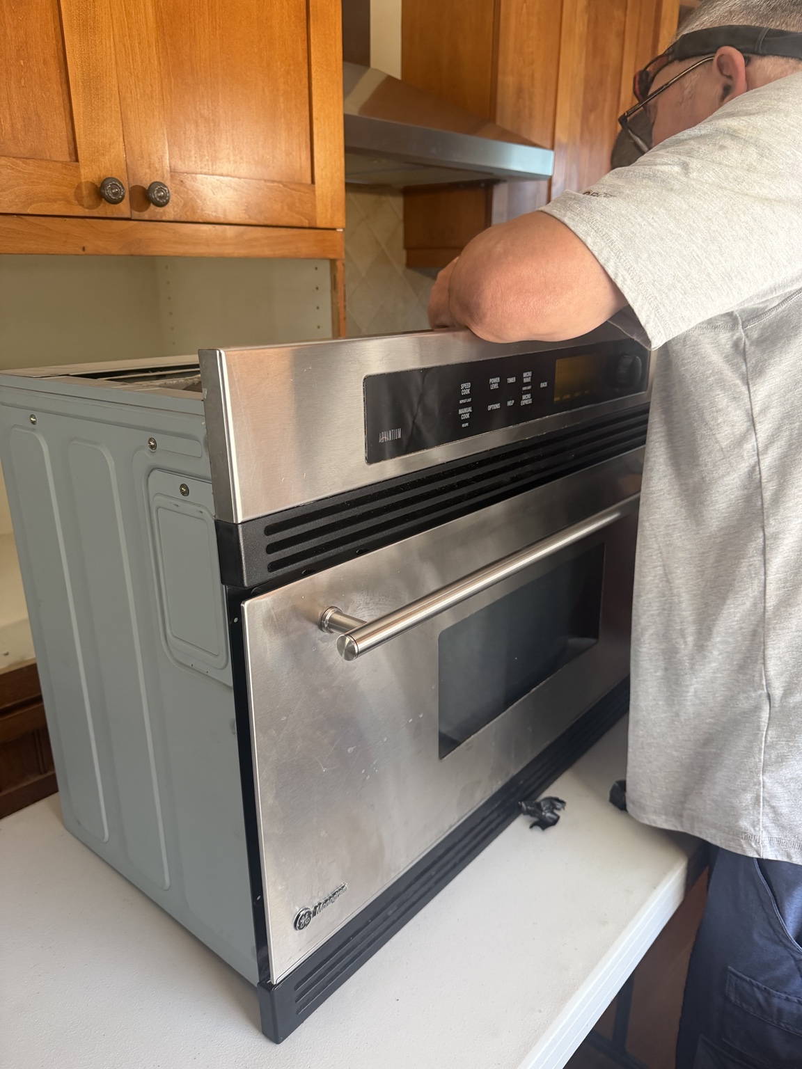 GE Monogram Advantium appliance during thermal fuse and capacitor replacement in Torrance